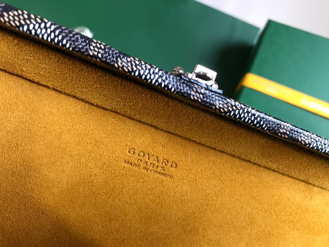GRAND HÔTEL TRUNK BAG 24 IN BLACK GOYARDINE CANVAS AND CALFSKIN