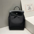 HERBAG A DOS ZIP RETOURNE BACKPACK 29 IN BLACK CANVAS AND CALFSKIN